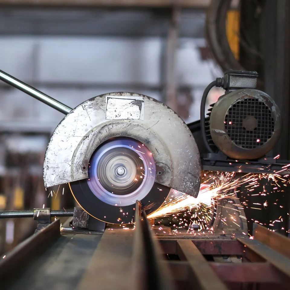 Action shot of rotary cutting tool with sparks flying